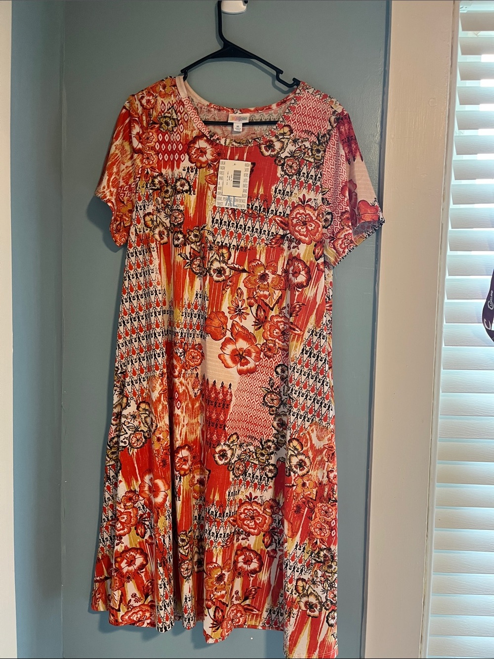 LuLaRoe Orange Floral Patchwork Swing Dress